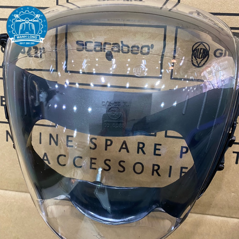 Kính đèn pha Piaggio zip