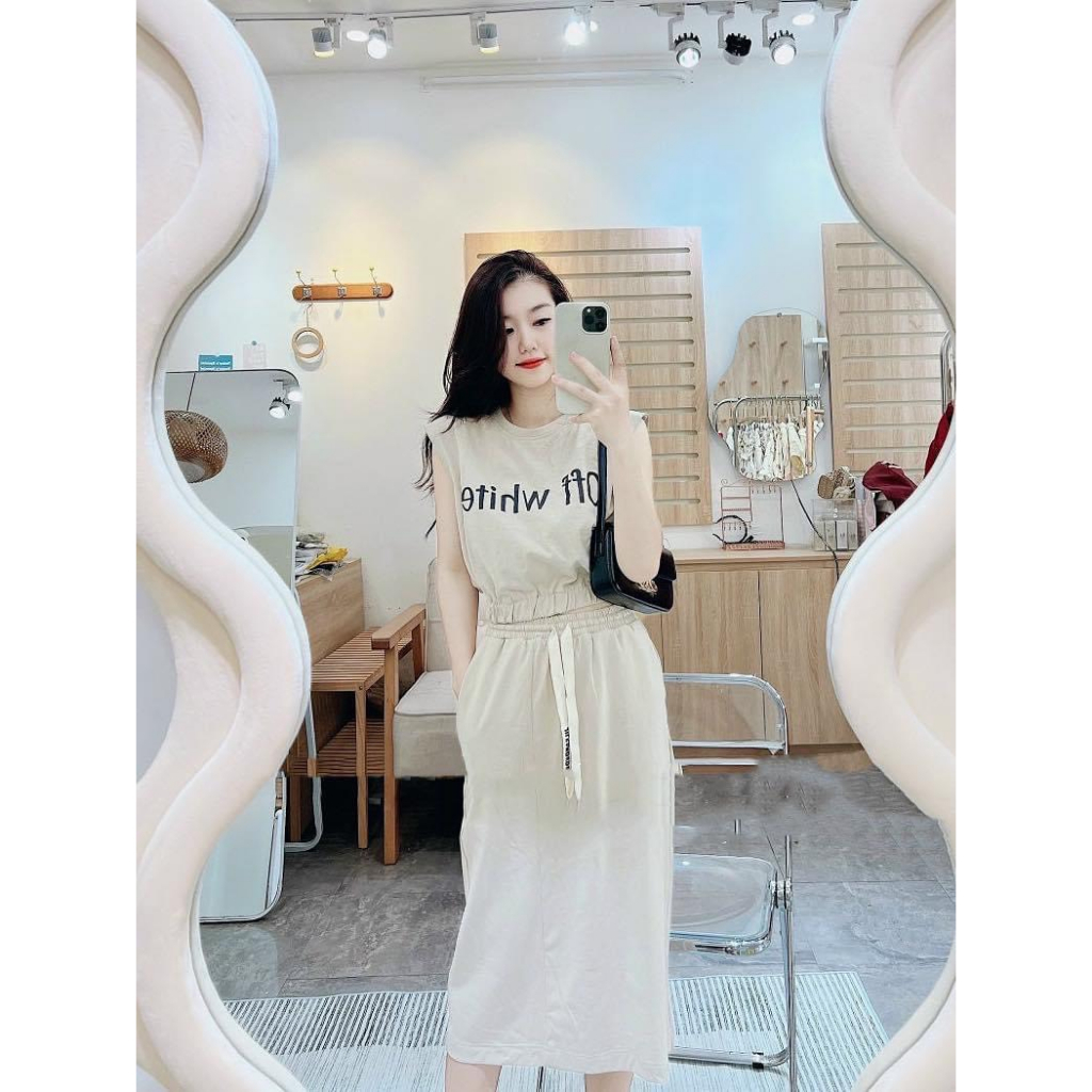 Set bộ nữ áo croptop + chân váy xẻ tà Off White BH2390