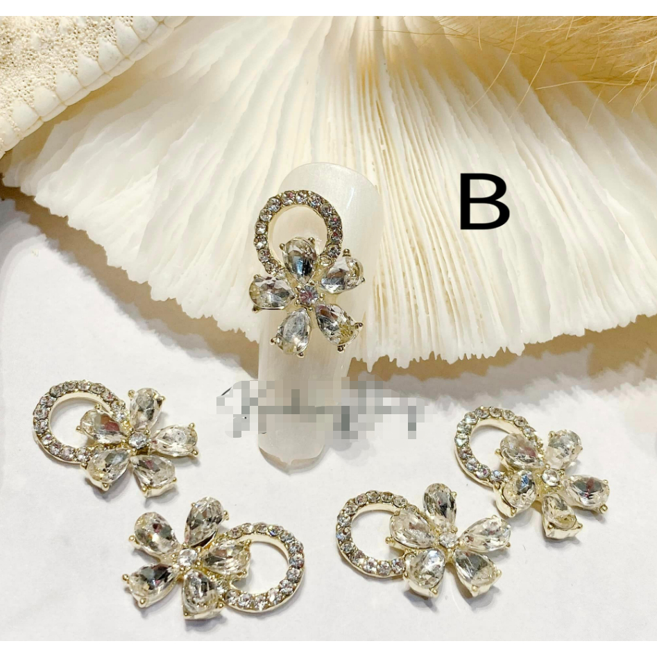 Mã chamr nơ tròn đính đá nhé a