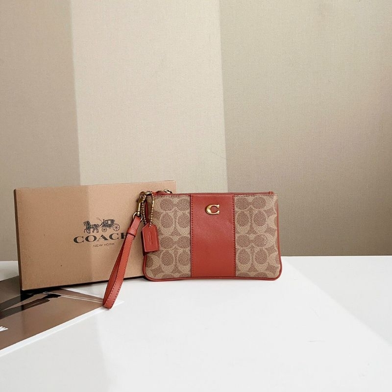 Mẫu ví coach đeo cổ tay siêu sang