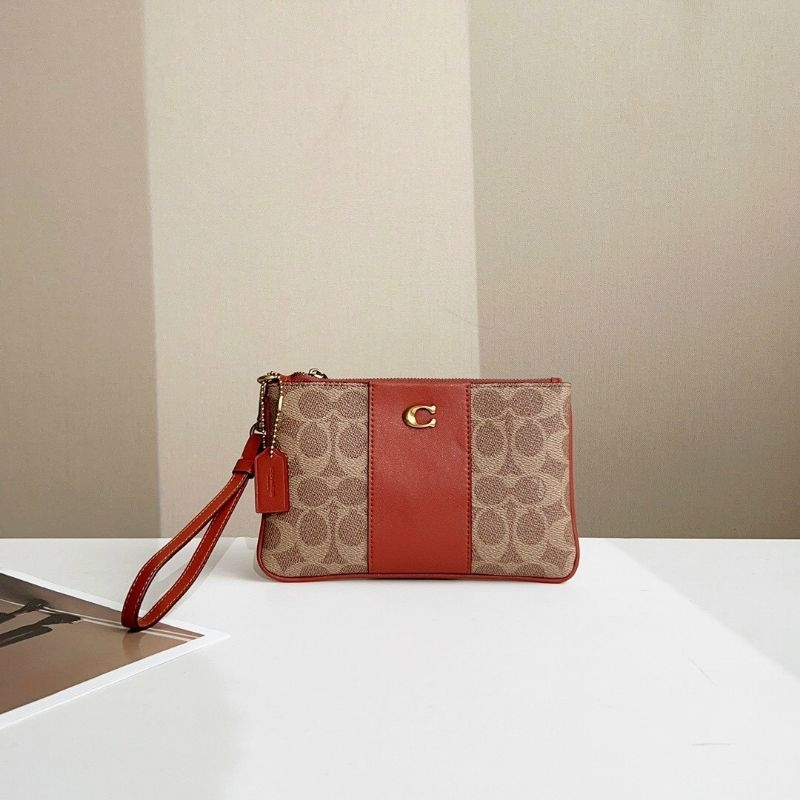 Mẫu ví coach đeo cổ tay siêu sang