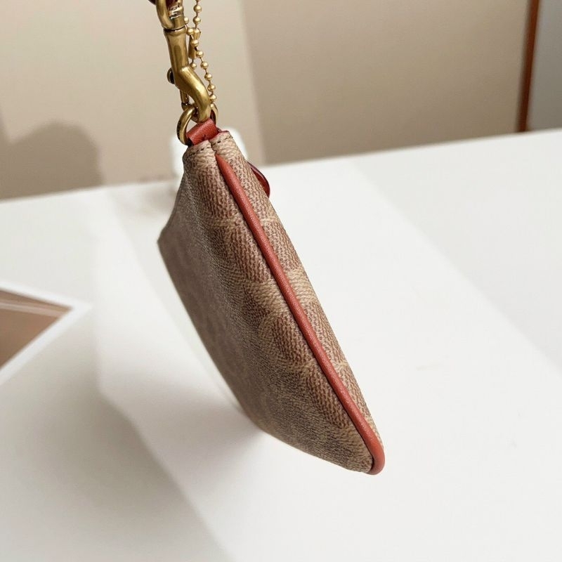 Mẫu ví coach đeo cổ tay siêu sang