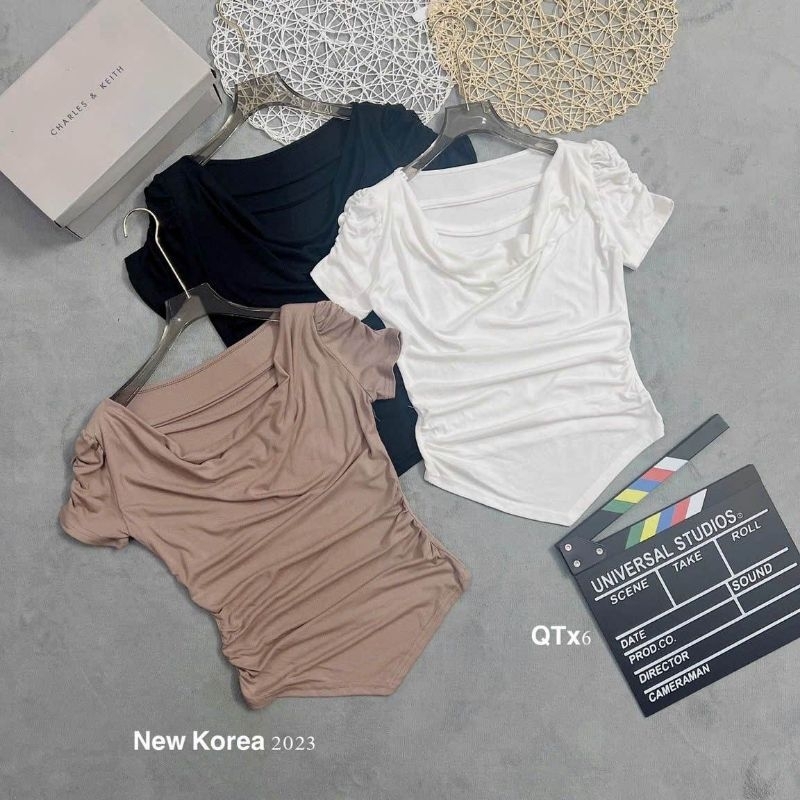 Áo thun cổ dây vạt nhọn hàng QC