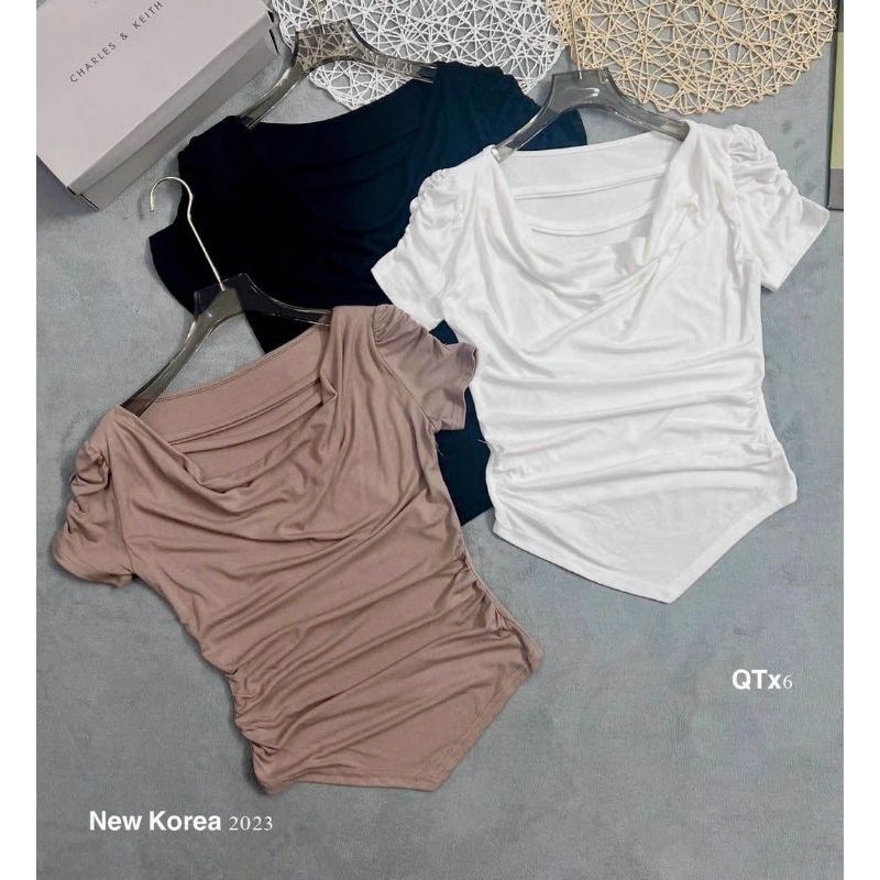 Áo thun cổ dây vạt nhọn hàng QC