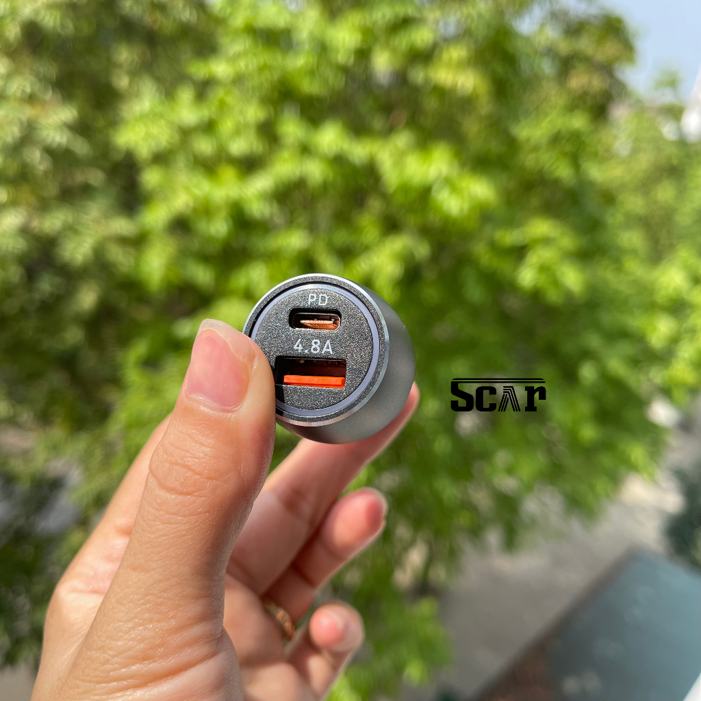 Tẩu sạc ô tô xe hơi PUGAN gồm 1 cổng USB-C tích hợp sạc nhanh và cổng USB 4.8A Tặng kèm dây sạc 3 đầu