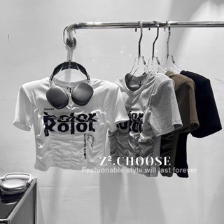 Áo croptop rúm eo nhún eo thun họa tiết chữ LuciK Shop AT0003