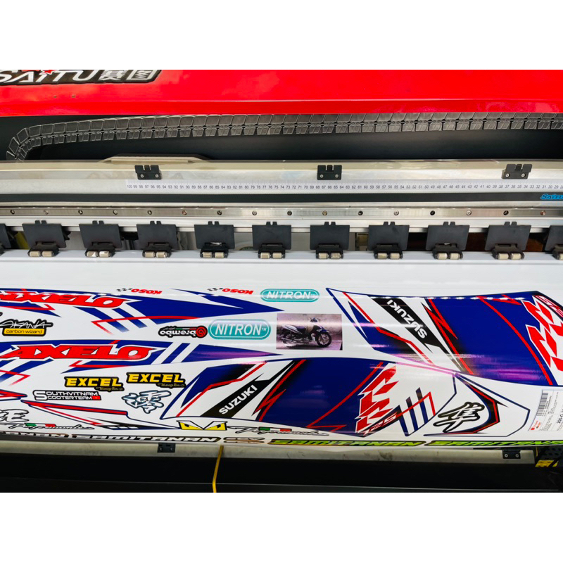 TEM AXELO ZIN XANH TRẮNG