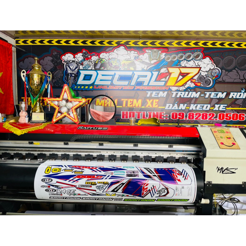 TEM AXELO ZIN XANH TRẮNG