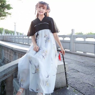 Đầm cổ trang cách tân tay dài thêu hoa