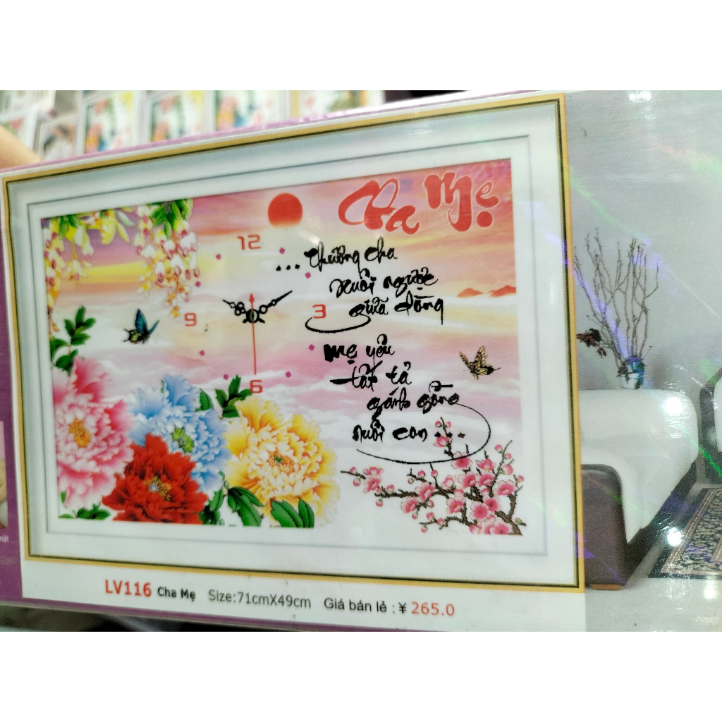 Tranh đính đá đồng hồ cha mẹ đi khắp thế gian Kích thước75x50Cm