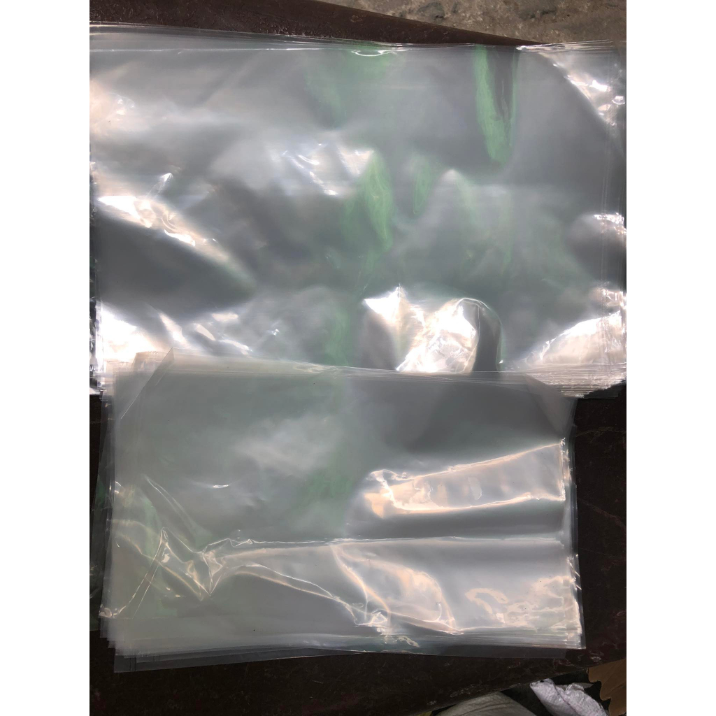 100g Bọc nilon sạch dẻo, trong loại đựng thực phẩm ( tặng kèm thun cột )