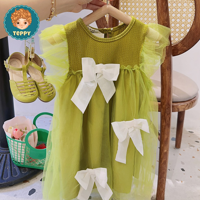 Đầm váy xanh cốm phối nơ cho bé gái