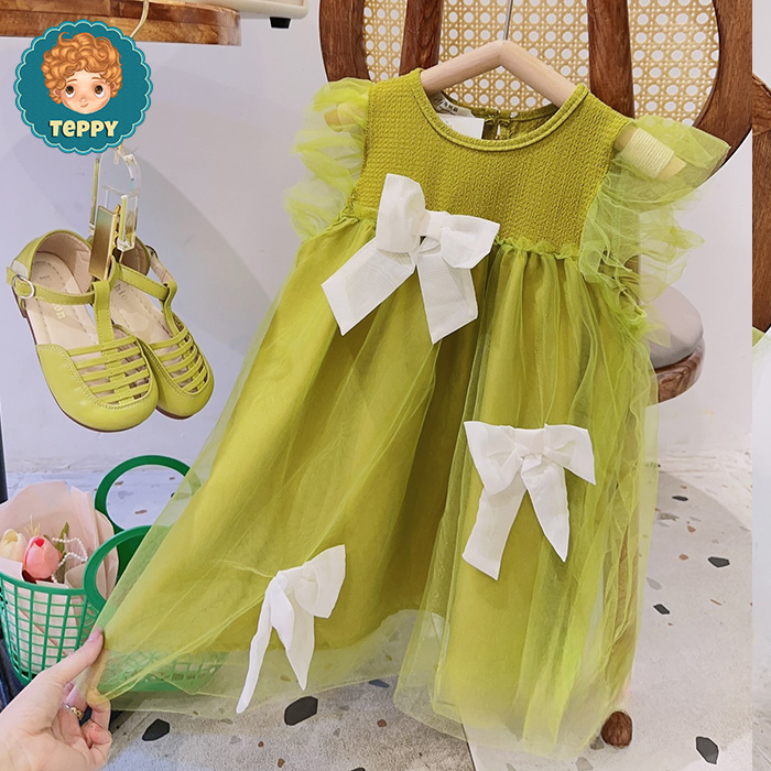 Đầm váy xanh cốm phối nơ cho bé gái