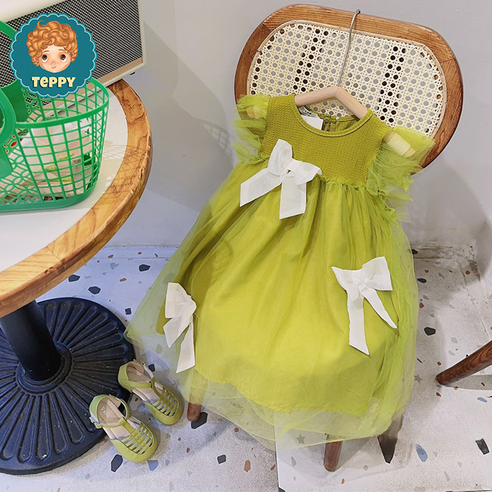 Đầm váy xanh cốm phối nơ cho bé gái