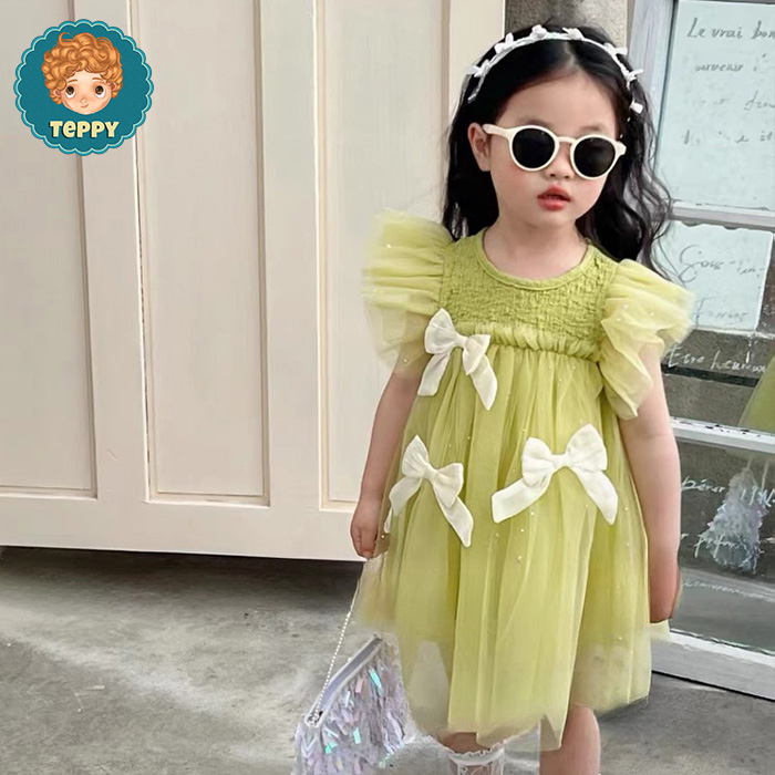 Đầm váy xanh cốm phối nơ cho bé gái