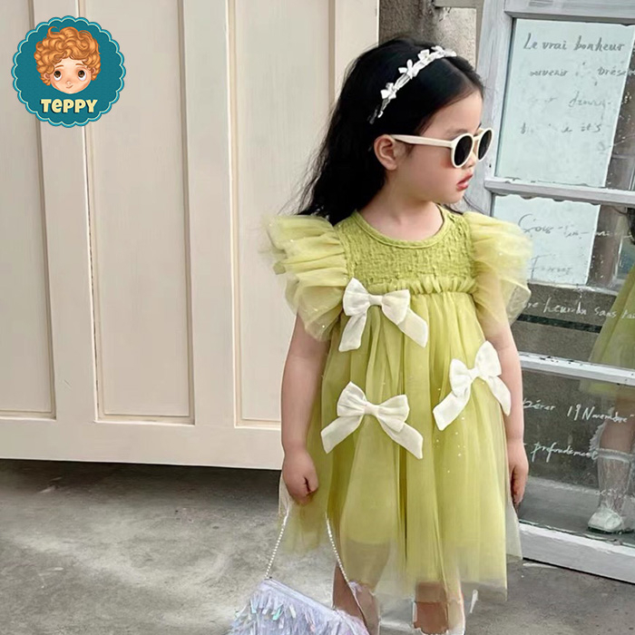 Đầm váy xanh cốm phối nơ cho bé gái