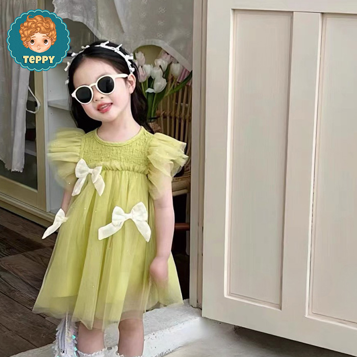 Đầm váy xanh cốm phối nơ cho bé gái