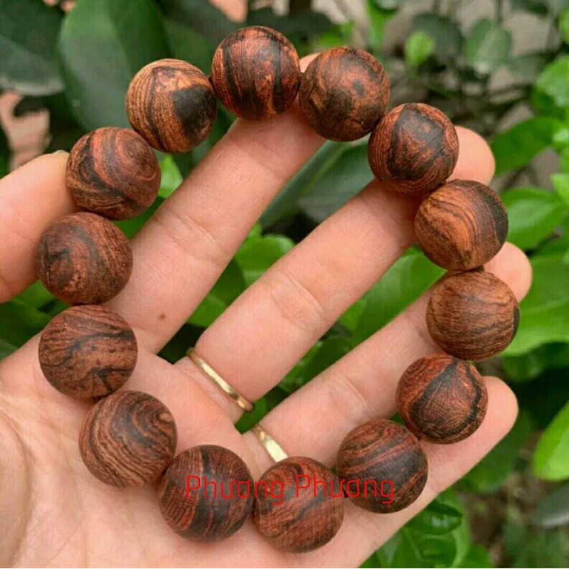 Vòng tay gỗ sưa đỏ hạt tròn vân mộc tự  nhiên