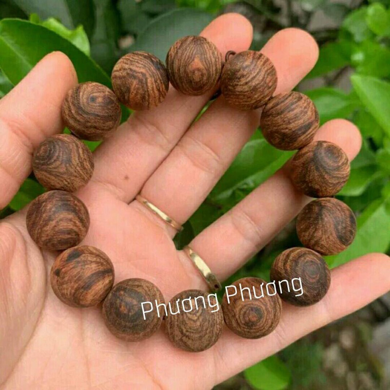 Vòng tay gỗ sưa đỏ hạt tròn vân mộc tự  nhiên