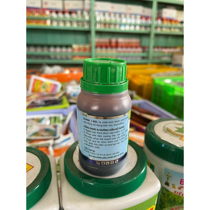 ATONIK 1.8 SL chai 100ml giúp hoa kiểng , cây ăn trái , rau màu phát triển tươi tốt