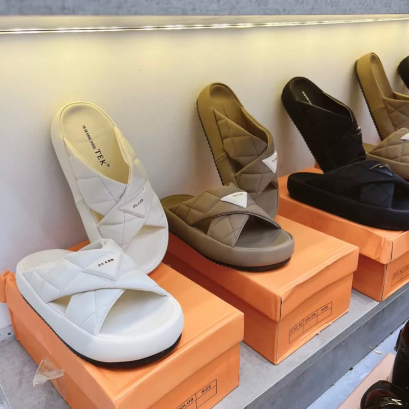 Dép nữ prada quai chéo da quả chám logo nổi fullbox . Thuytienshoes