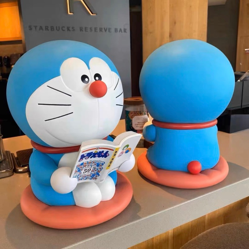 Mô hình Doraemon đọc sách