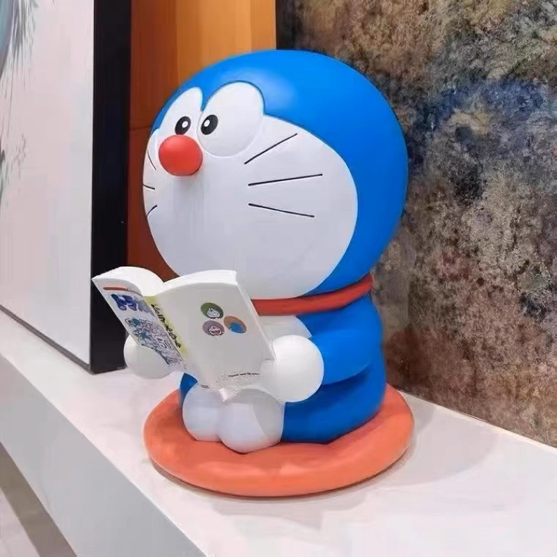 Mô hình Doraemon đọc sách