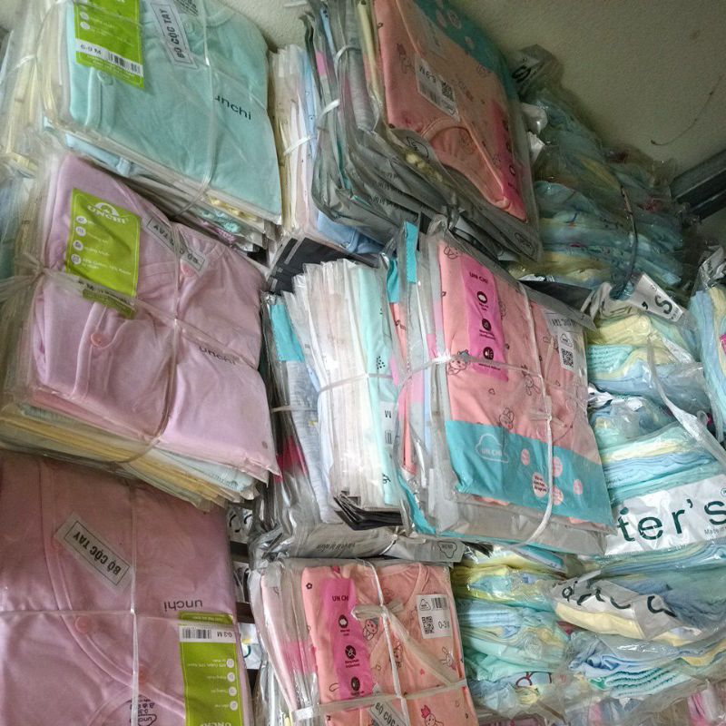 Bộ cộc Unchi khuy lệch sơ sinh (Mẫu họa tiết)