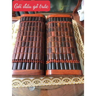 gối gỗ trắc đỏ đen .