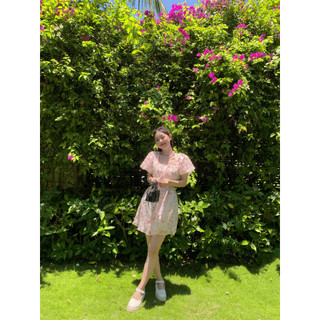 Đầm hoa khoét eo