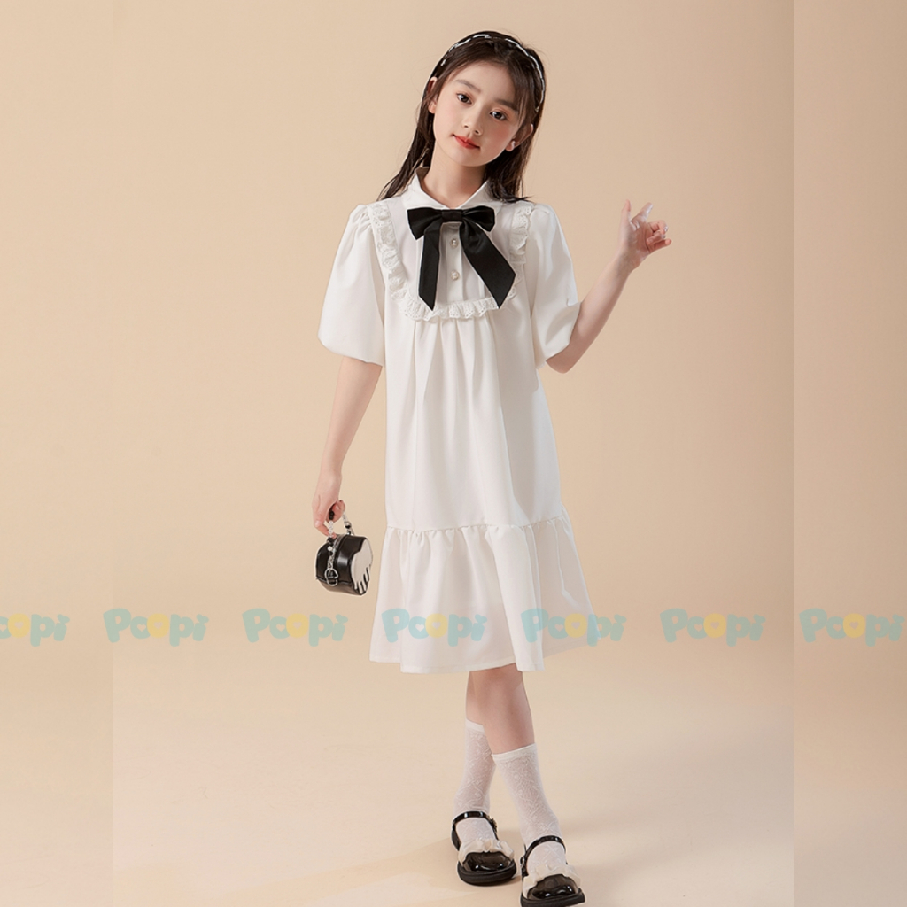 Váy Bé Gái Poopi Dáng Suông Đính Nơ Kiểu Đi Học Đi Chơi Cho Bé 2-10 Tuổi