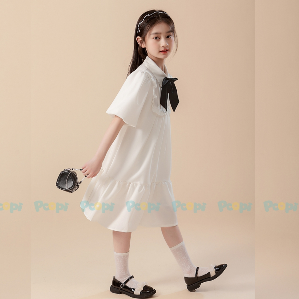 Váy Bé Gái Poopi Dáng Suông Đính Nơ Kiểu Đi Học Đi Chơi Cho Bé 2-10 Tuổi