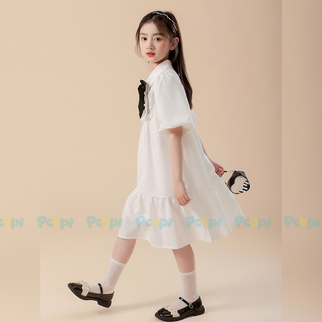 Váy Bé Gái Poopi Dáng Suông Đính Nơ Kiểu Đi Học Đi Chơi Cho Bé 2-10 Tuổi