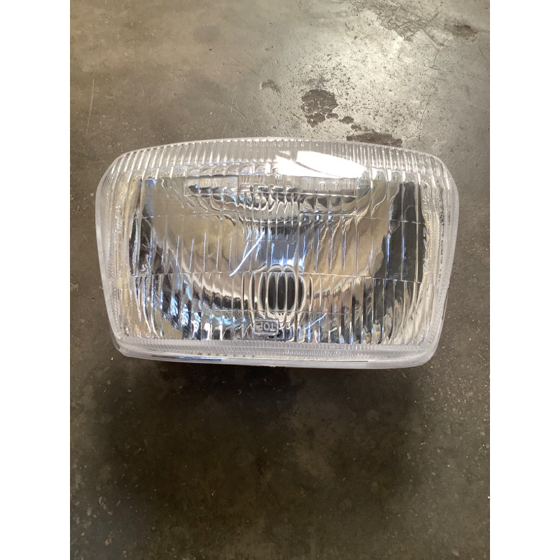 Pha đèn  ,choá đèn của xe Dream hàng loại thường và hàng Đài Loan