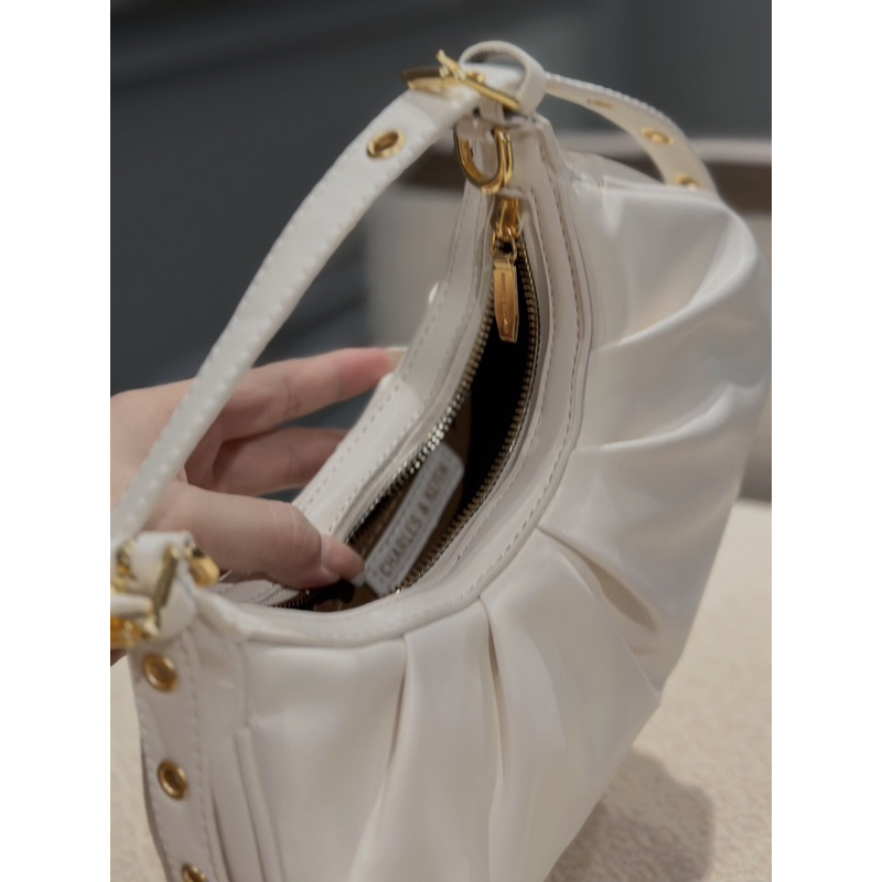 Túi CNK kẹp nách dáng cong sz22