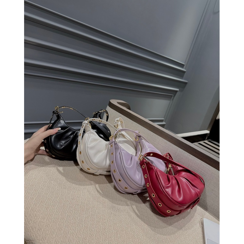 Túi CNK kẹp nách dáng cong sz22