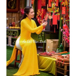 Áo dài 4 tà màu vàng cúc - áo dài đan linh