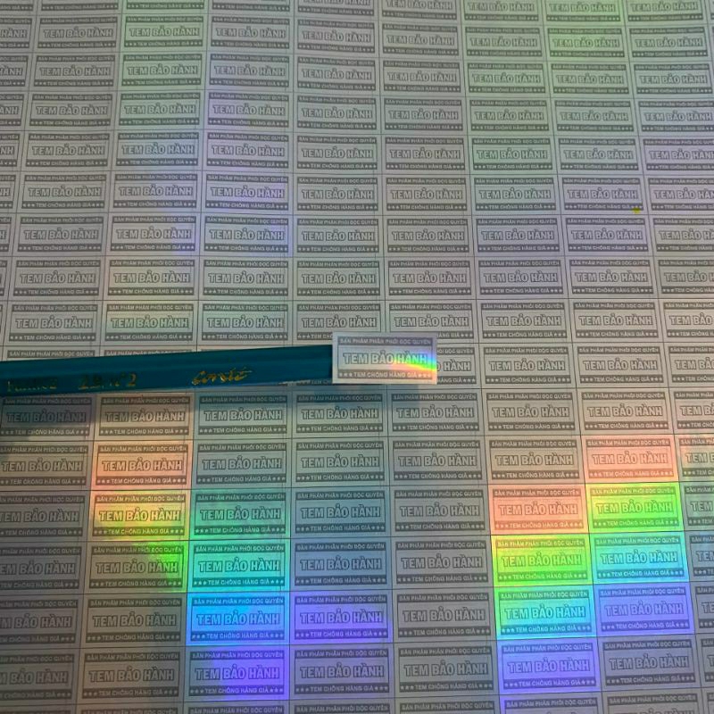 Tem bảo hành decal 7 màu 1x2 cm