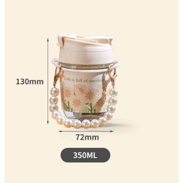 BÌNH NƯỚC THUỶ TINH CÓ QUAI XÁCH NGỌC TRAI XỊN SÒ