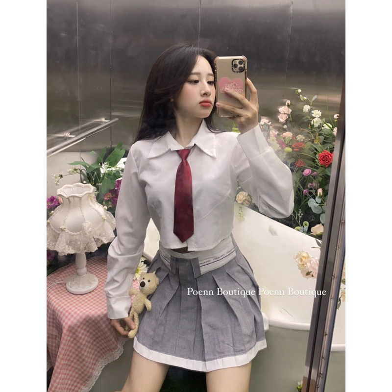 Chân váy tenis xám kèm bé gấu xinh