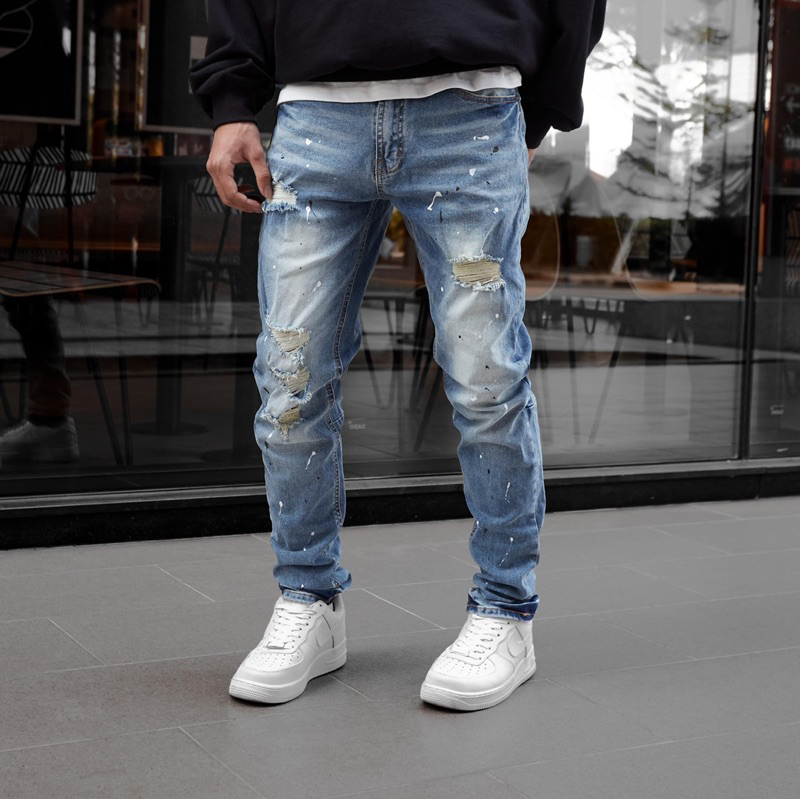 Quần jean nam cao cấp streetwear KQ31 màu xanh wash vẫy sơn rách bui bậm form slimfit chất jean co giãn, thoải mái.