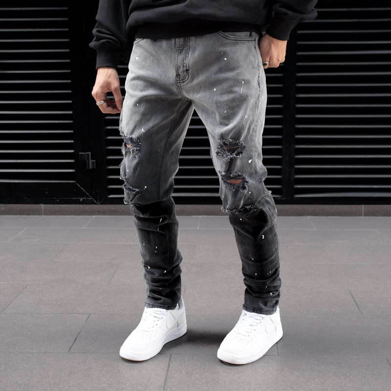 Quần jean nam cao cấp streetwear màu đen wash vẫy sơn rách bui bậm form slimfit chất jean co giãn, thoải mái.