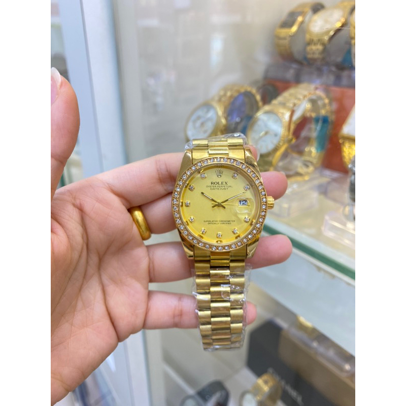 Đồng hồ nam Rolex - viền đá dây kim loại chống nước.