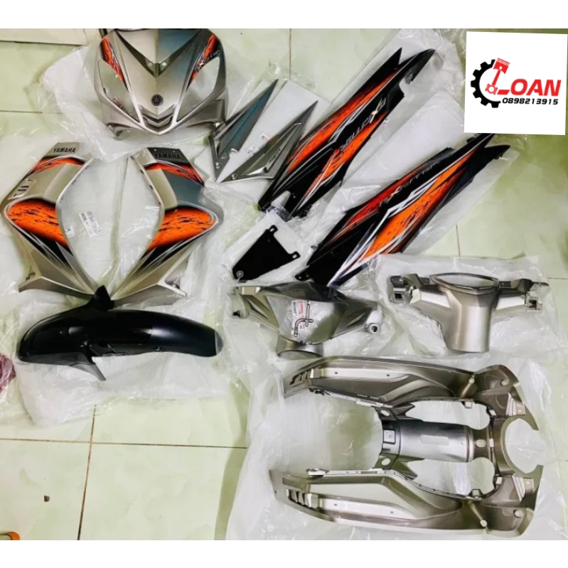 DAN ÁO , VỎ NHỰA EXCITER 2010 12 MÓN BÓNG KÈM TEM _ HƯƠNG RACING