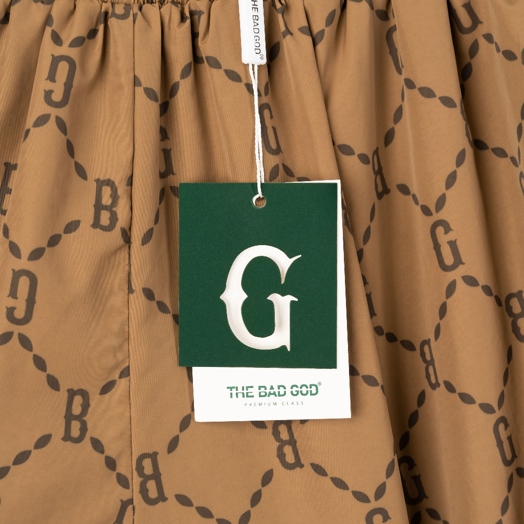 Quần short gió The Bad God Monogram màu nâu