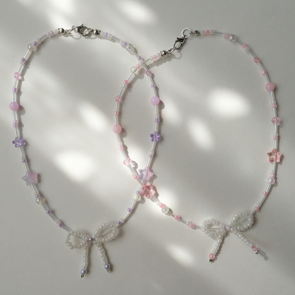 Dây chuyền hạt cườm hoạ tiết nơ phong cách y2k