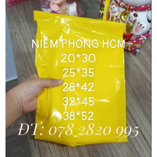 1kg túi niêm phong màu vàng, túi nilong dán miệng ship cod.