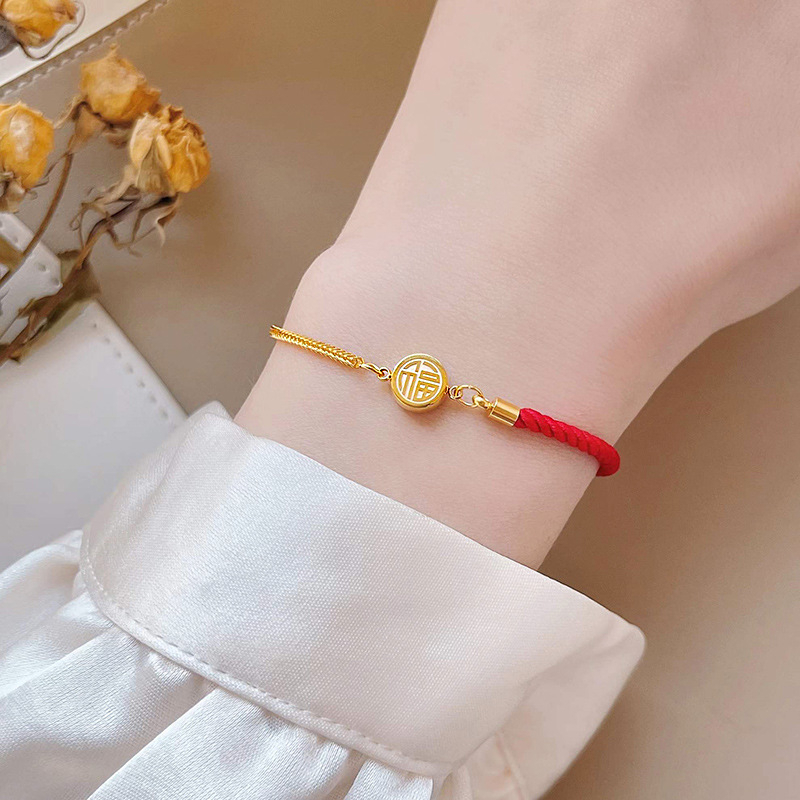 Lắc tay titan 100% không đen gỉ mẫu dây chỉ đỏ LT74