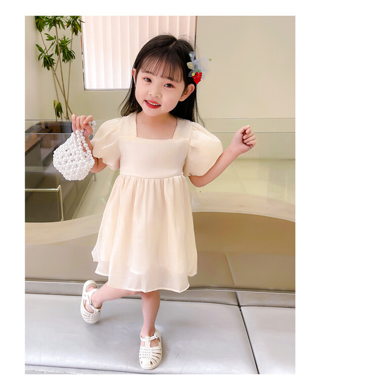 Đầm hè bé gái màu kem thiết kế tay bồng chất voan lụa quảng châu