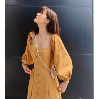Đầm vàng bò cổ vuông nút dừa (kèm hình thật)